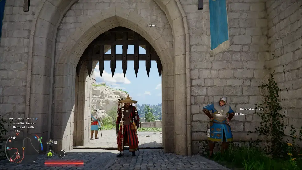 Герой в красной мантии в воротах каменного замка Hernand среди охранников из Mount & Blade 2